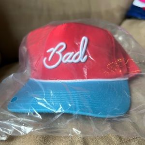 Bad Birdie Red and Blue Trucker Hat with White Script